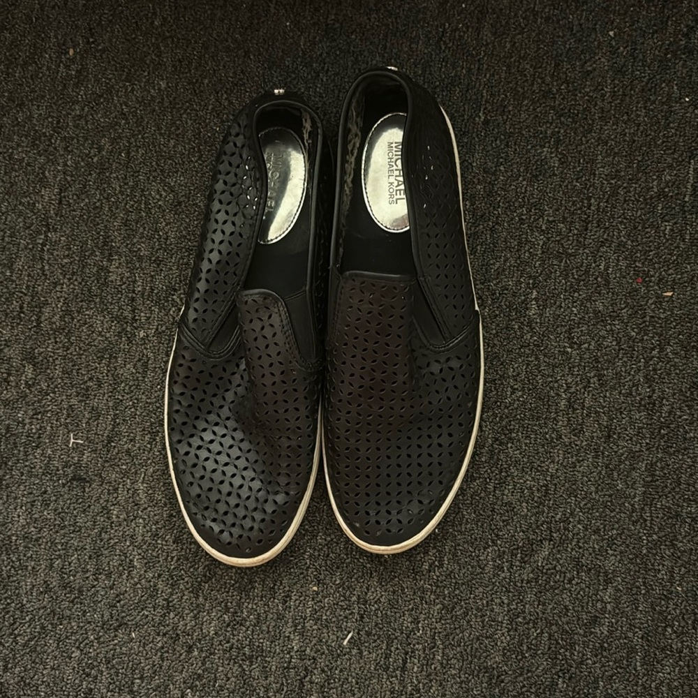 Black leather Michael Kors slip one
